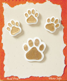 Gold paws scrapbook embellishments